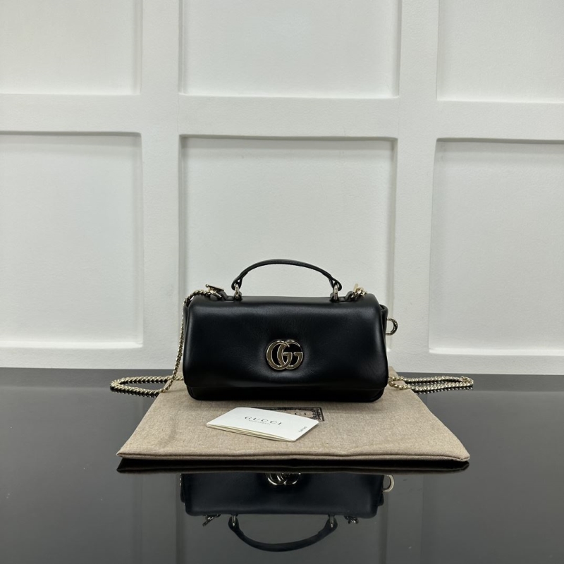 G*u*i top handle bags